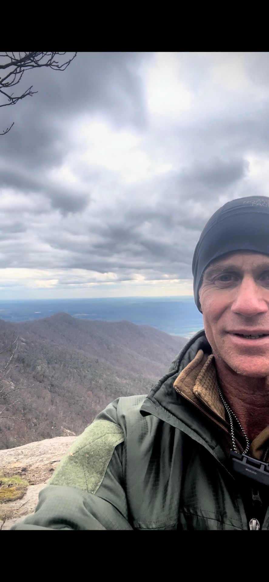 Nathan at a mountain summit